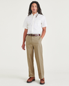 Front view of model wearing New British Khaki Signature Iron Free Khakis, Relaxed Fit with Stain Defender®.