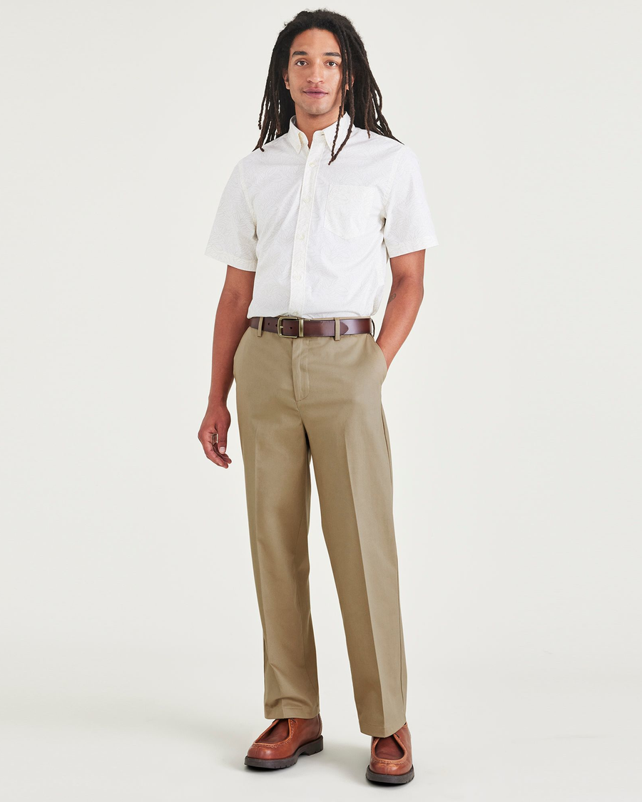 Front view of model wearing New British Khaki Signature Iron Free Khakis, Relaxed Fit with Stain Defender®.