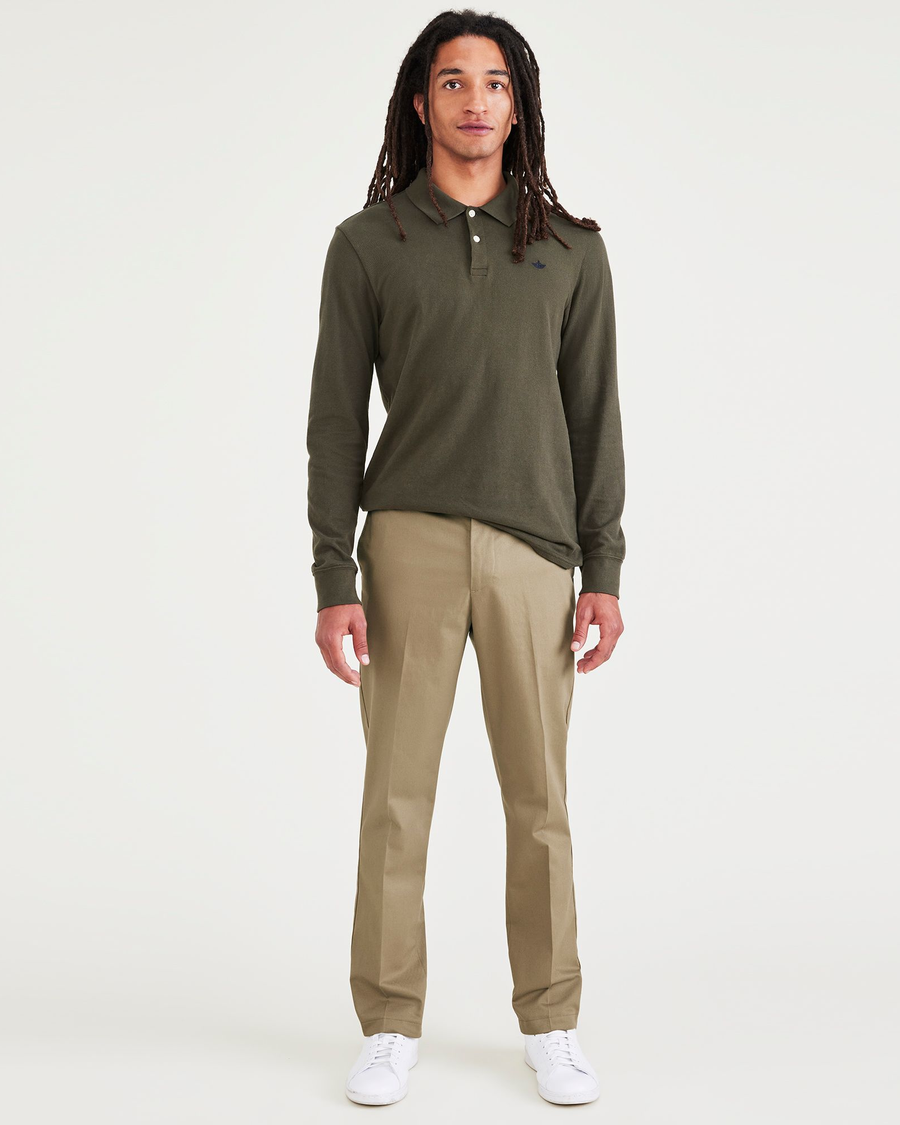 Front view of model wearing New British Khaki Signature Iron Free Khakis, Slim Fit with Stain Defender®.