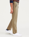 Side view of model wearing New British Khaki Signature Iron Free Khakis, Straight Fit with Stain Defender®.
