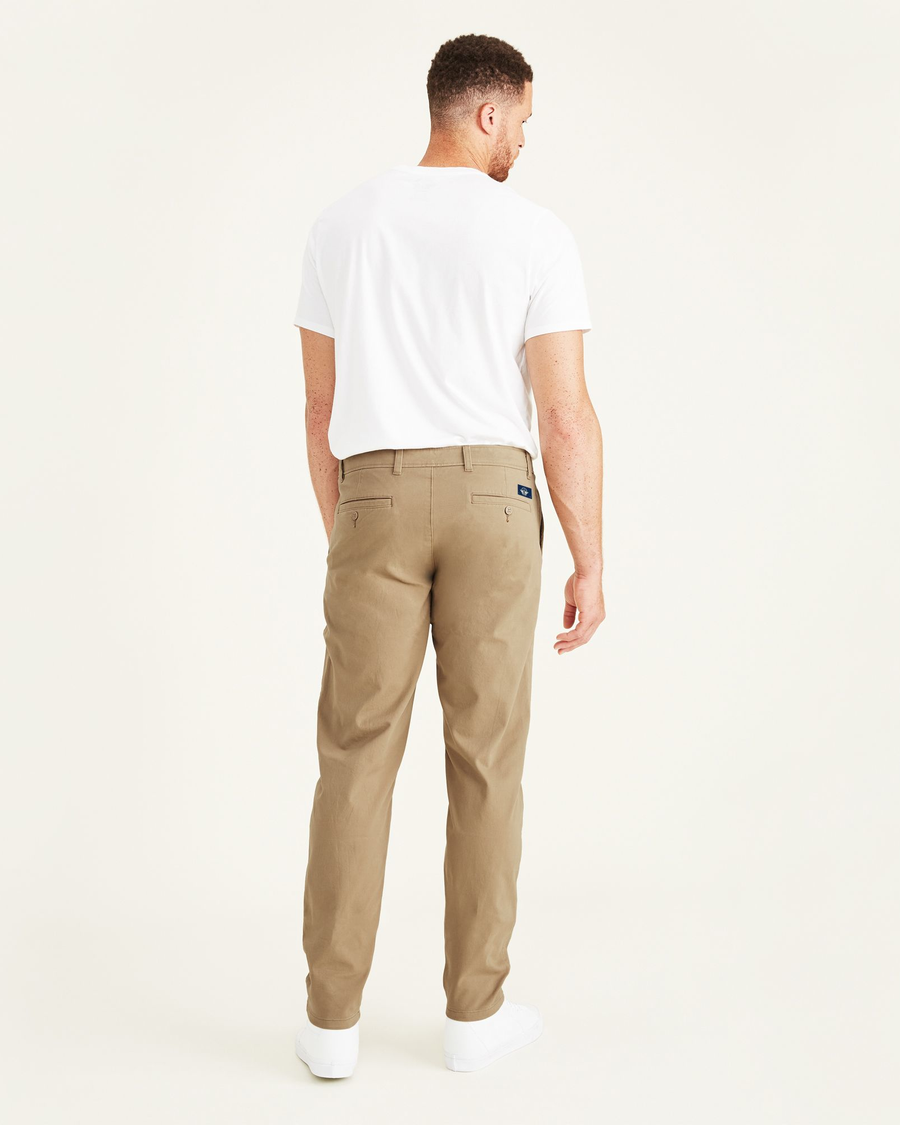 Back view of model wearing New British Khaki Ultimate Chinos, Athletic Fit (Big and Tall).