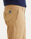 View of model wearing New British Khaki Ultimate Chinos, Athletic Fit.