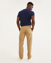 Back view of model wearing New British Khaki Ultimate Chinos, Athletic Fit.
