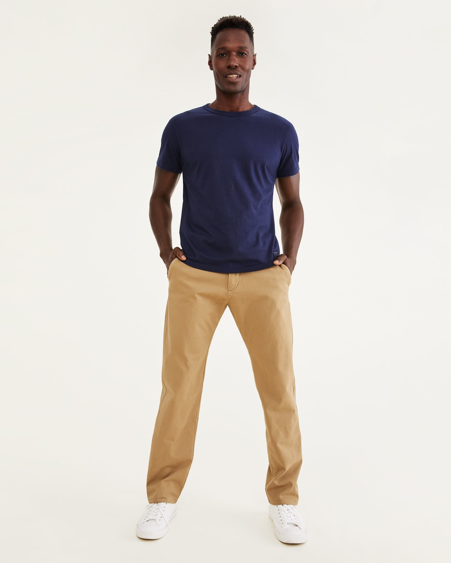 Front view of model wearing New British Khaki Ultimate Chinos, Athletic Fit.