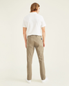 Back view of model wearing New British Khaki Ultimate Chinos, Slim Fit.
