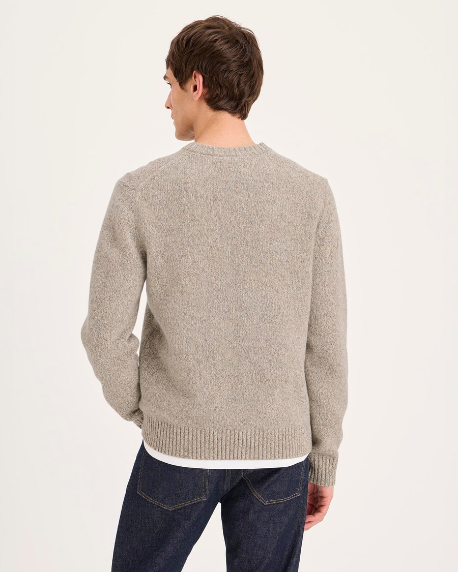 Back view of model wearing New England Twill Premium Crewneck Sweater, Regular Fit.