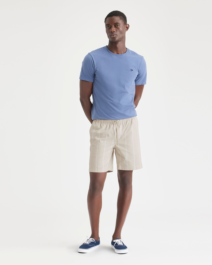 Front view of model wearing Nomad Sahara Khaki Ultimate Pull On 9.5" Shorts.