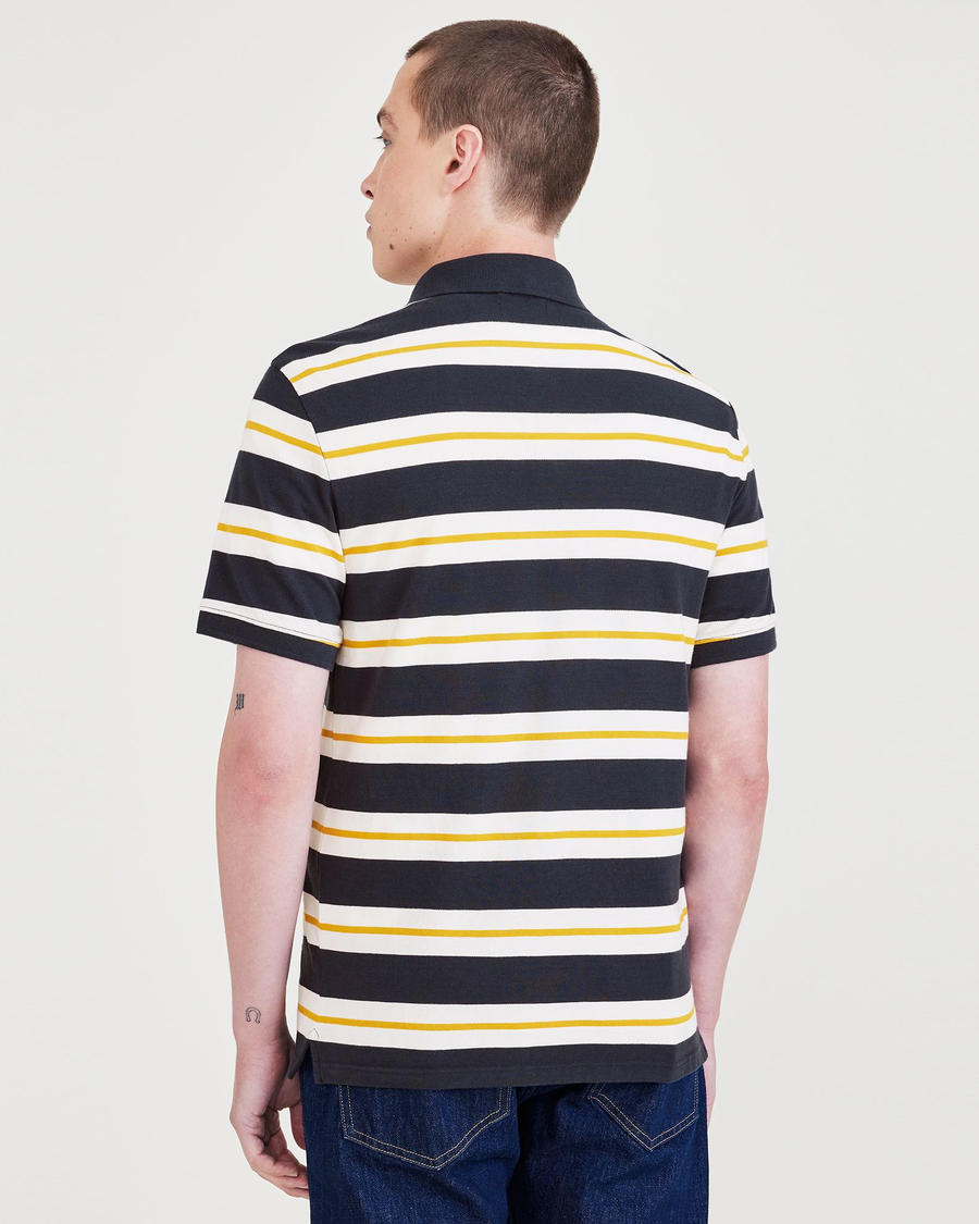 Back view of model wearing Nugget Gold Rib Collar Polo, Slim Fit.