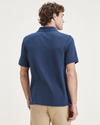 Back view of model wearing Ocean Blue Rib Collar Polo, Slim Fit.