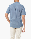 Back view of model wearing Ocean Blue Signature Comfort Flex Shirt, Classic Fit.