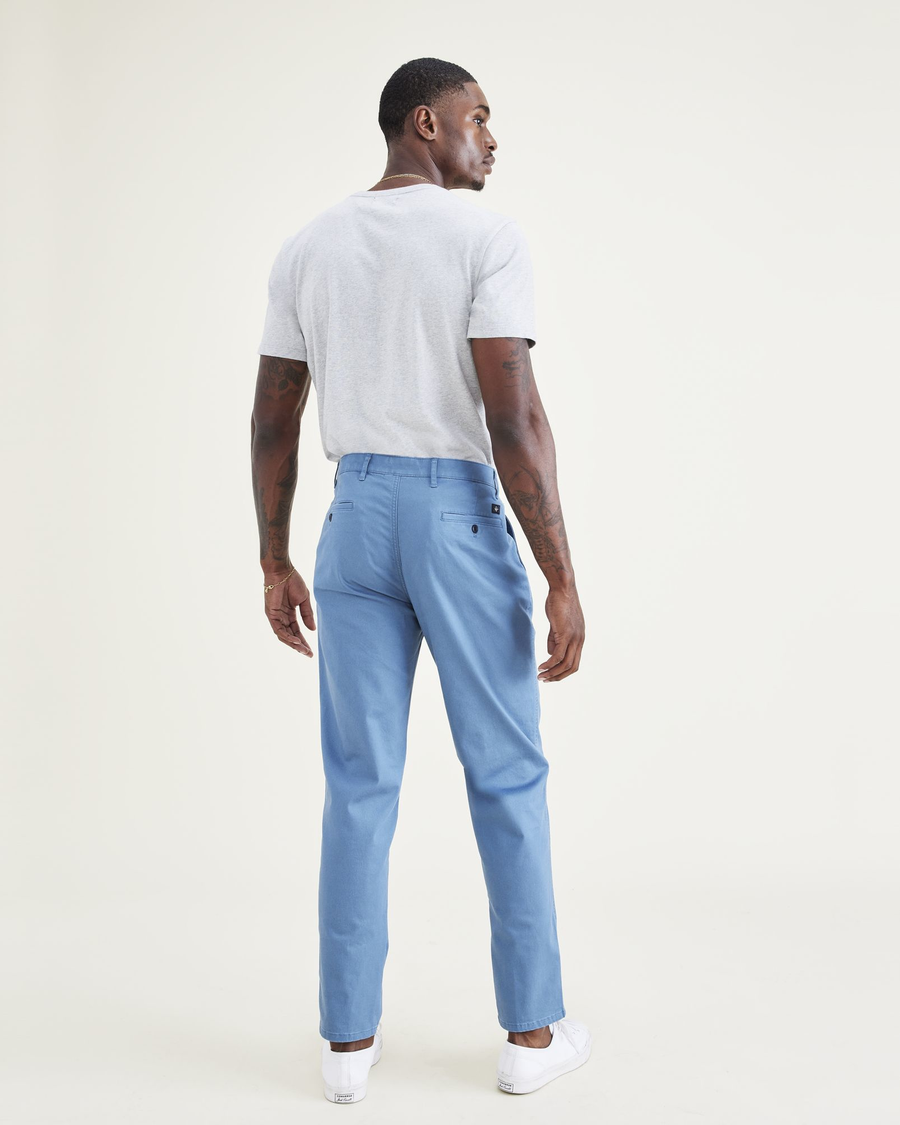 Back view of model wearing Oceanview Original Chinos, Straight Tapered Fit.