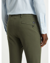 View of model wearing Olive Alpha Khakis, Skinny Fit.