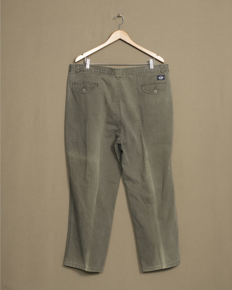 Back view of model wearing Olive Made in USA Pants, Olive Herringbone Double Pleated Pants - 38 x 27.