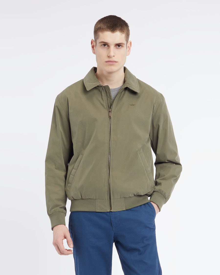 Front view of model wearing Olive Microtwill Relaxed Bomber Jacket.