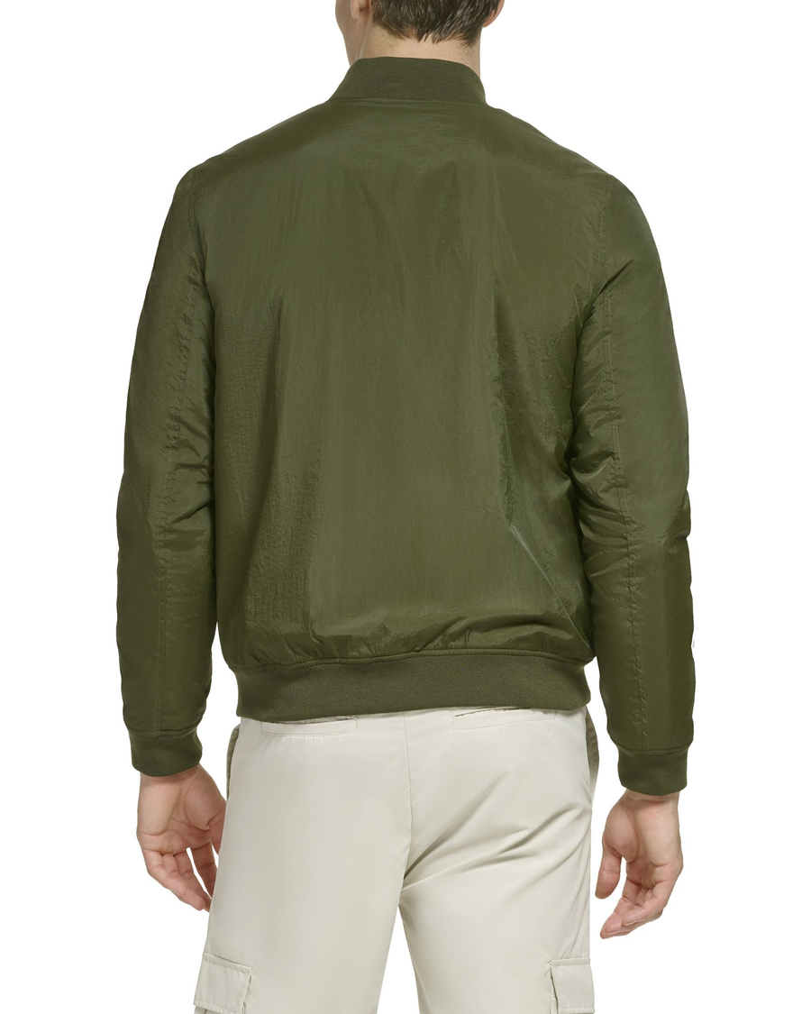 Back view of model wearing Olive Recycled Dry Touch Nylon Bomber.