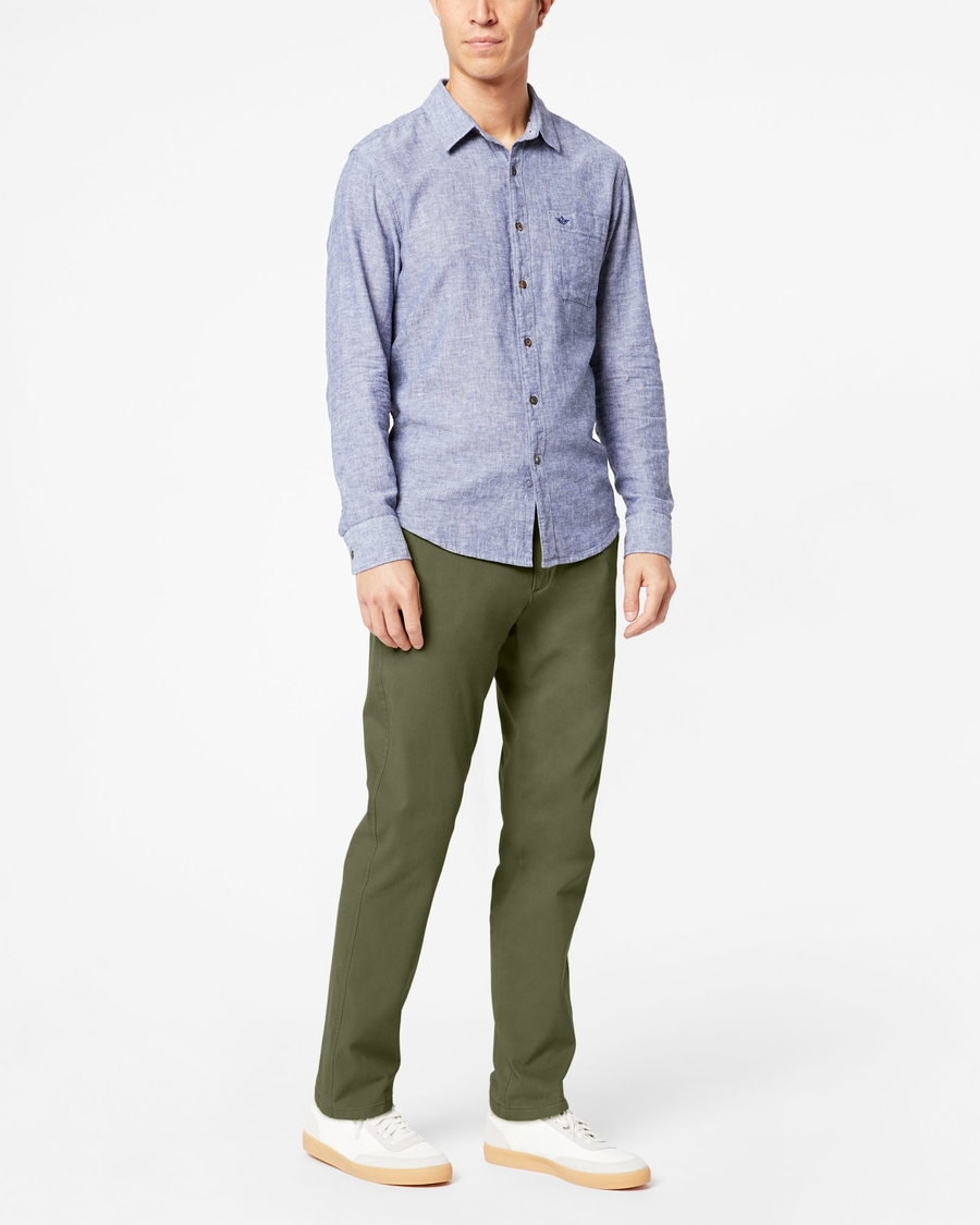 Front view of model wearing Olive Ultimate Chinos, Slim Fit.