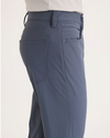 Side view of model wearing Ombre Blue Go Airweave 5-Pocket, Slim Tapered Fit.