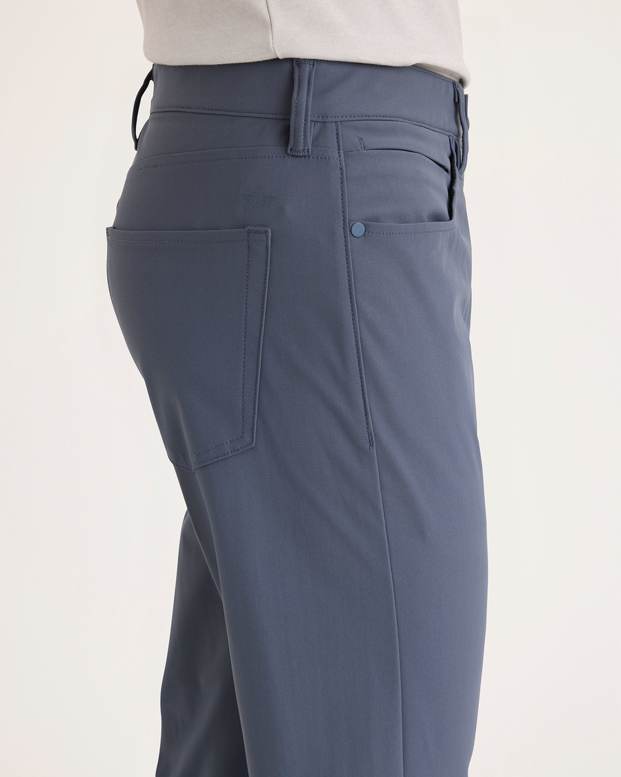 Side view of model wearing Ombre Blue Go Airweave 5-Pocket, Slim Tapered Fit.