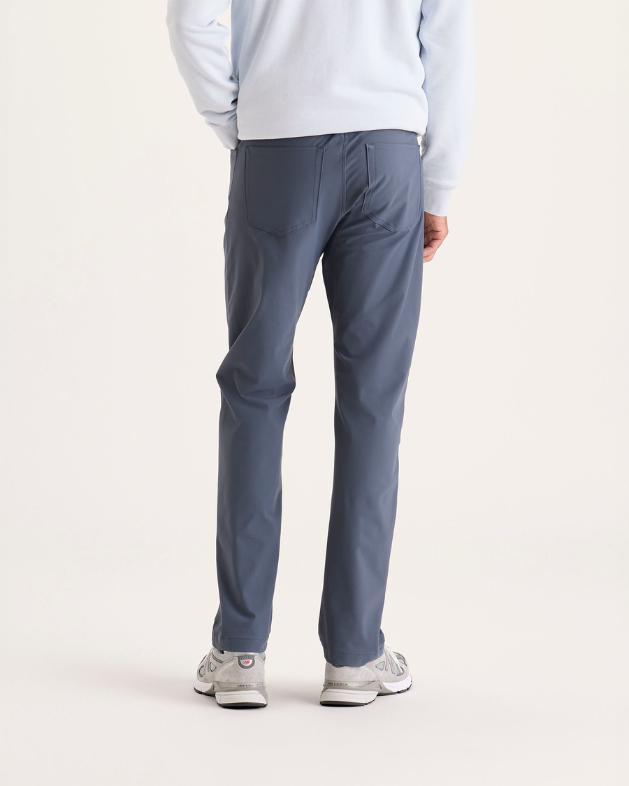 Back view of model wearing Ombre Blue Go Airweave 5-Pocket, Straight Fit.