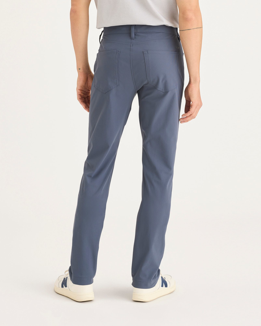 Back view of model wearing Ombre Blue Go Airweave Chino, Slim Tapered Fit.