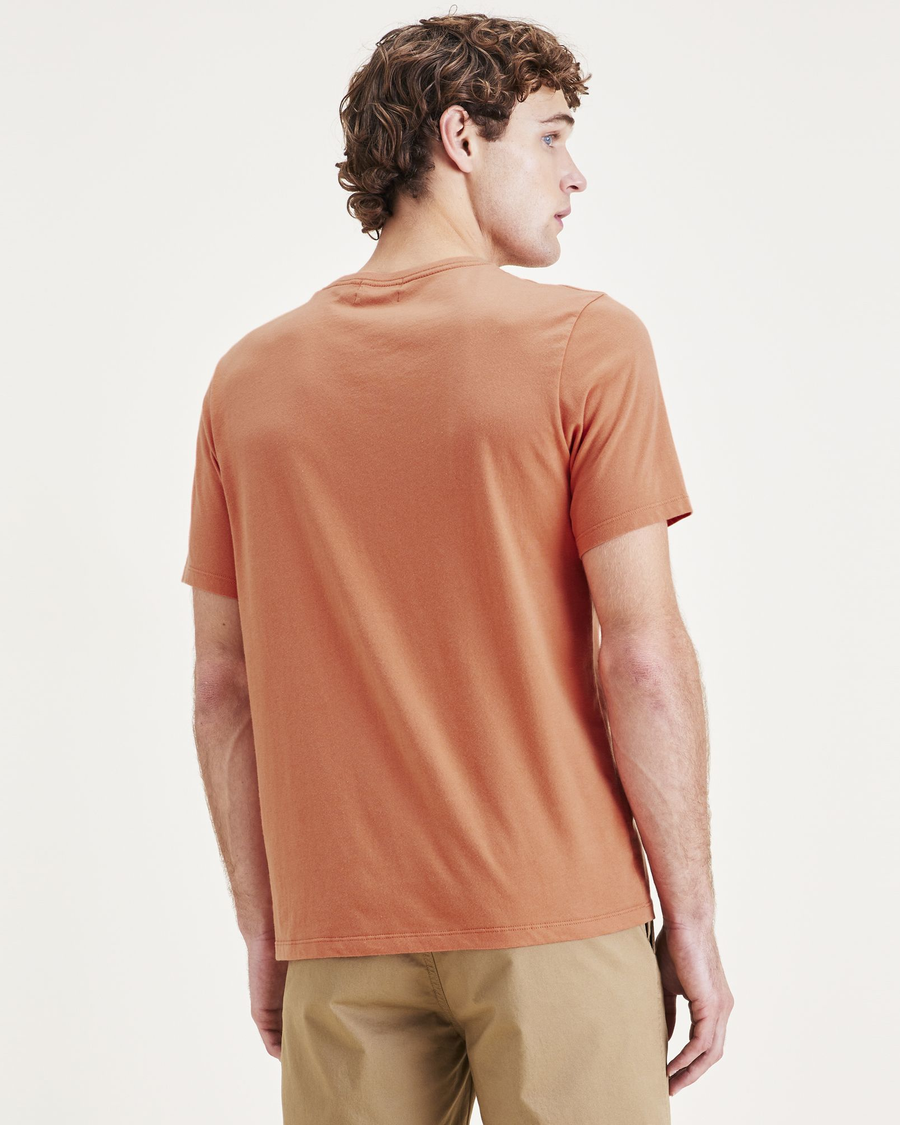 Back view of model wearing Orange Sun & Surf Graphic Tee, Slim Fit.
