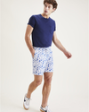 View of model wearing Orient Blue Playa 7" Shorts.