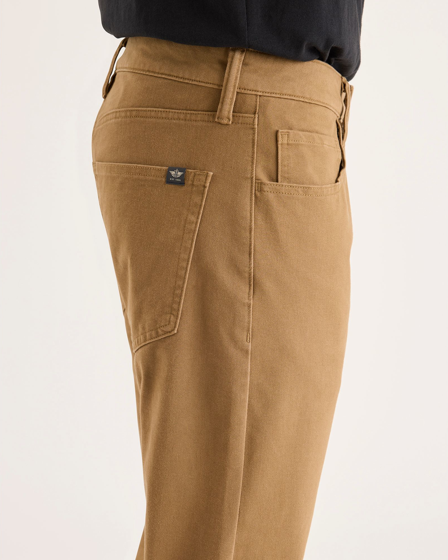 Side view of model wearing Otter All-Day 5-Pocket, Straight Fit.