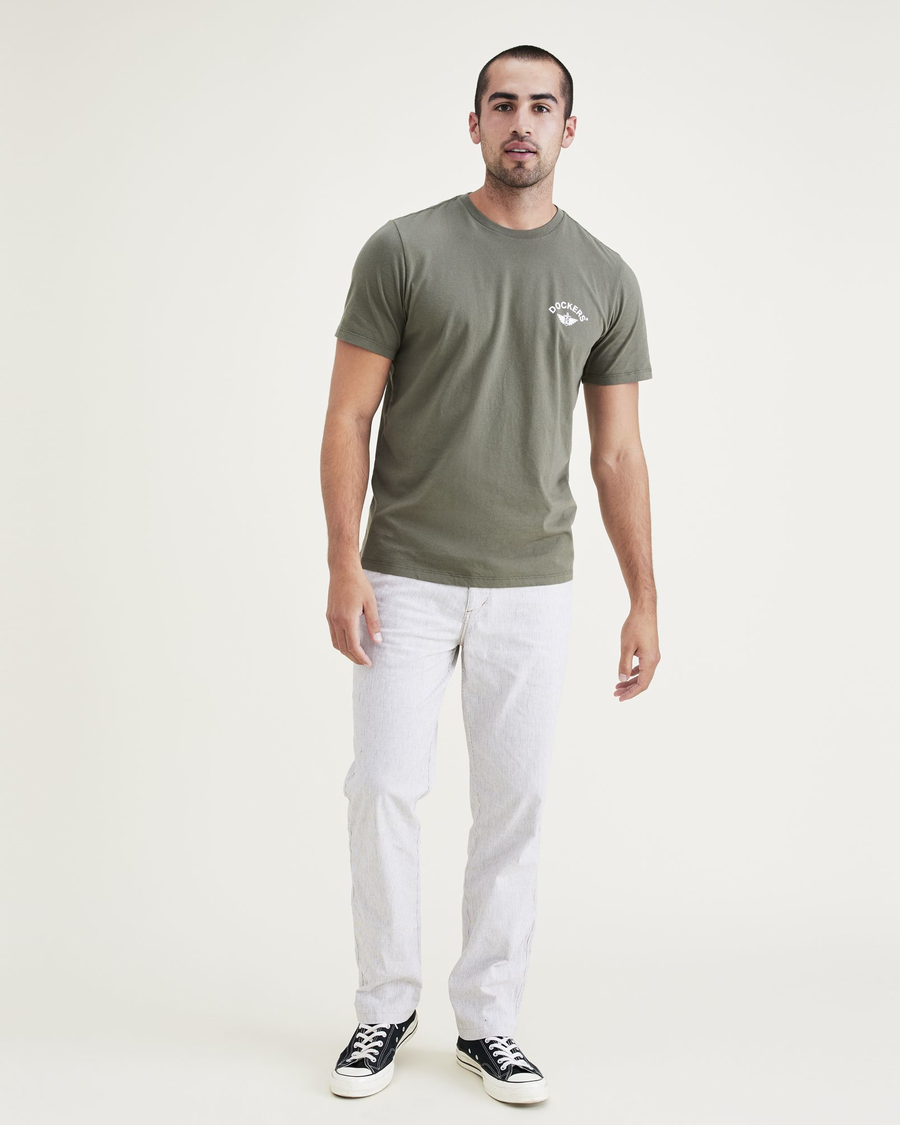 Front view of model wearing Otter Ultimate Chinos, Straight Fit.