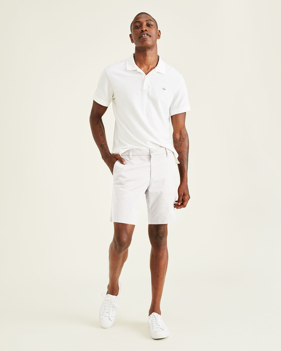 Front view of model wearing Paper White Ultimate 9.5" Shorts, Straight Fit.