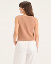 Back view of model wearing Peach Bloom Sweater Tank, Regular Fit.