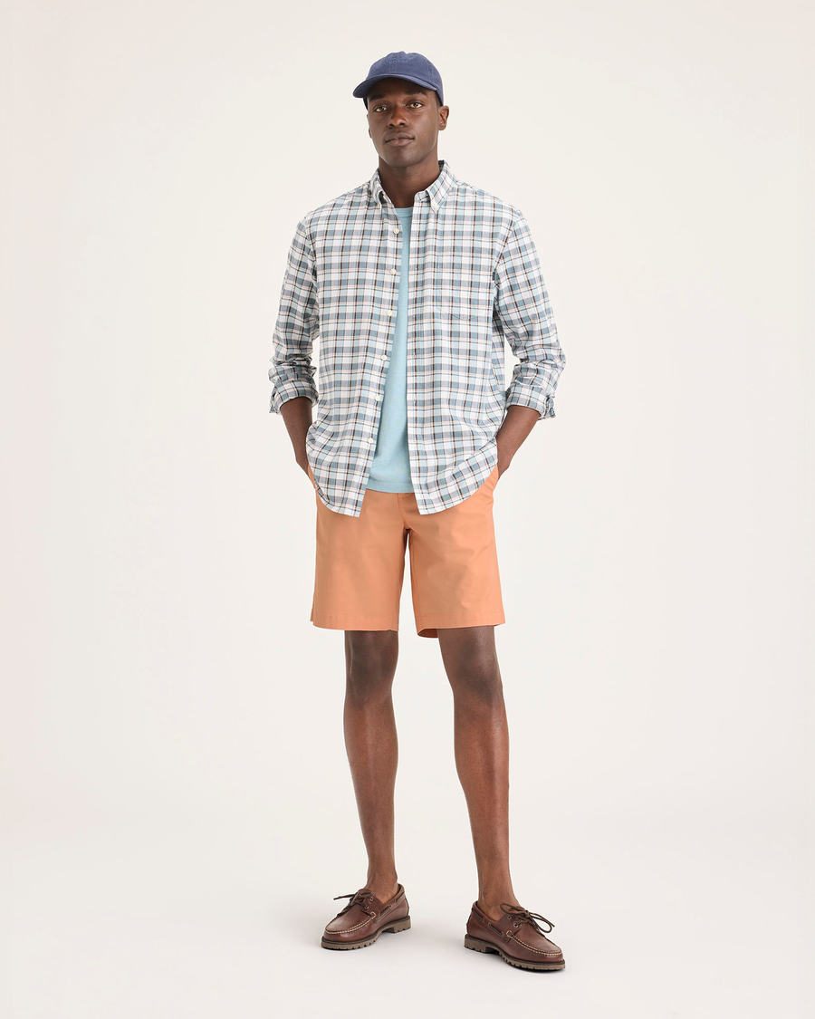 Front view of model wearing Peach Bloom Ultimate 9.5" Shorts.