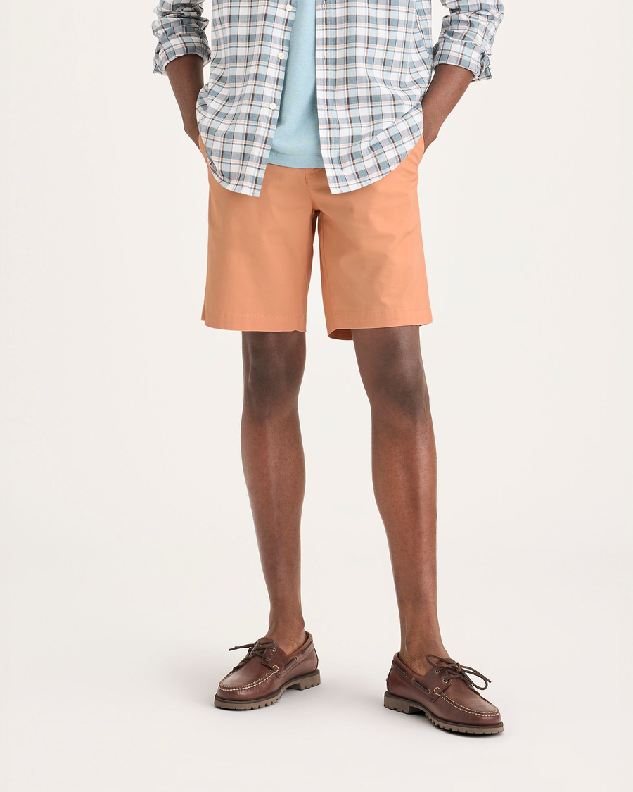 Front view of model wearing Peach Bloom Ultimate 9.5" Shorts.