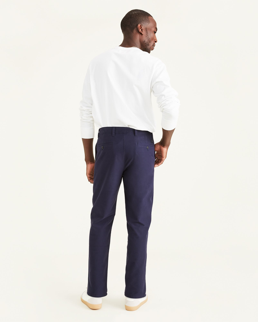 Back view of model wearing Pembroke Comfort Knit Chinos, Straight Fit.