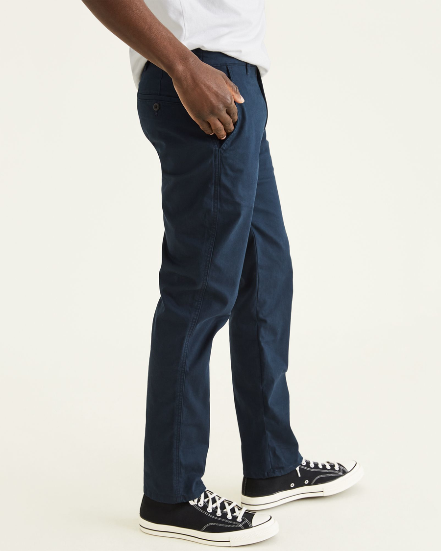 Side view of model wearing Pembroke Original Chinos, Tapered Fit.