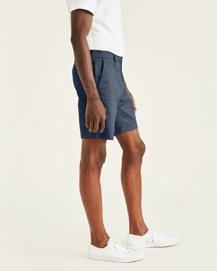 Side view of model wearing Pembroke Ultimate 9.5" Shorts.