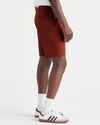 Side view of model wearing Picante Ultimate 9.5" Shorts, Straight Fit.