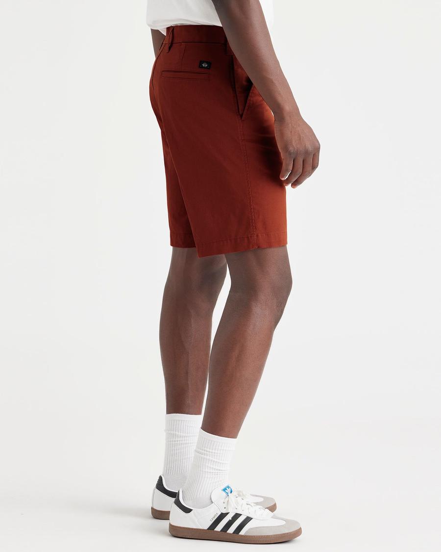 Side view of model wearing Picante Ultimate 9.5" Shorts.