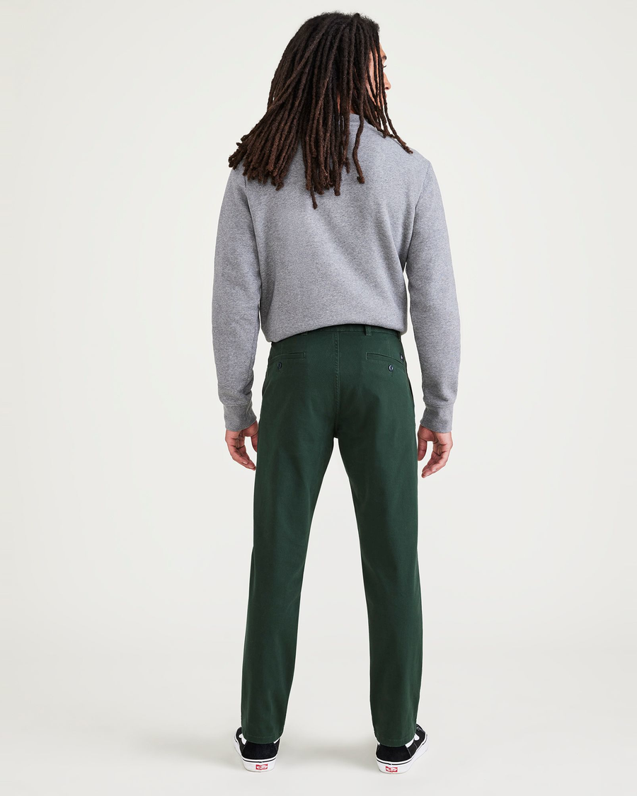 Back view of model wearing Pine Grove Ultimate Chinos, Slim Fit.