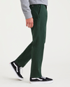 Side view of model wearing Pine Grove Ultimate Chinos, Slim Fit.