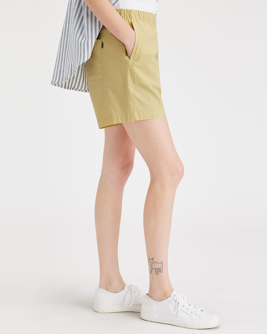 Side view of model wearing Pineapple Slice Clay Pull-On Short.