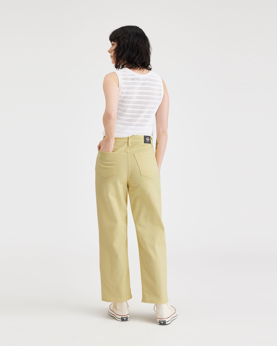 Back view of model wearing Pineapple Slice Jean Cut Pants, High Straight Fit.