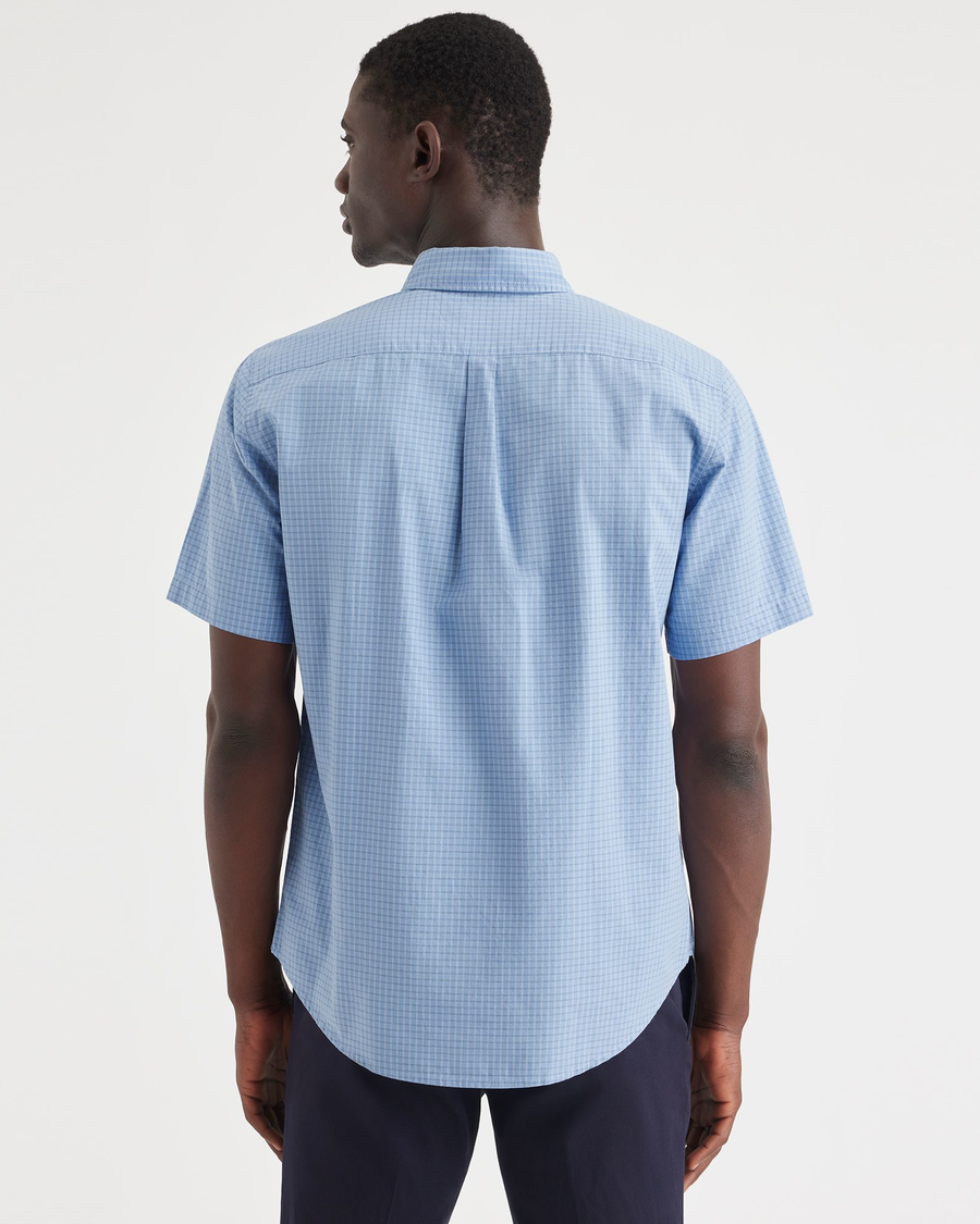 Back view of model wearing Pinnacle Poplin Bel Air Blue Essential Button-Up Shirt, Classic Fit.