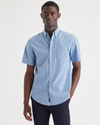 Front view of model wearing Pinnacle Poplin Bel Air Blue Essential Button-Up Shirt, Classic Fit.