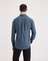 Back view of model wearing Placid Blue Original Button Up, Slim Fit.