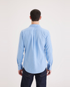 Back view of model wearing Placid Blue Original Button Up, Slim Fit.