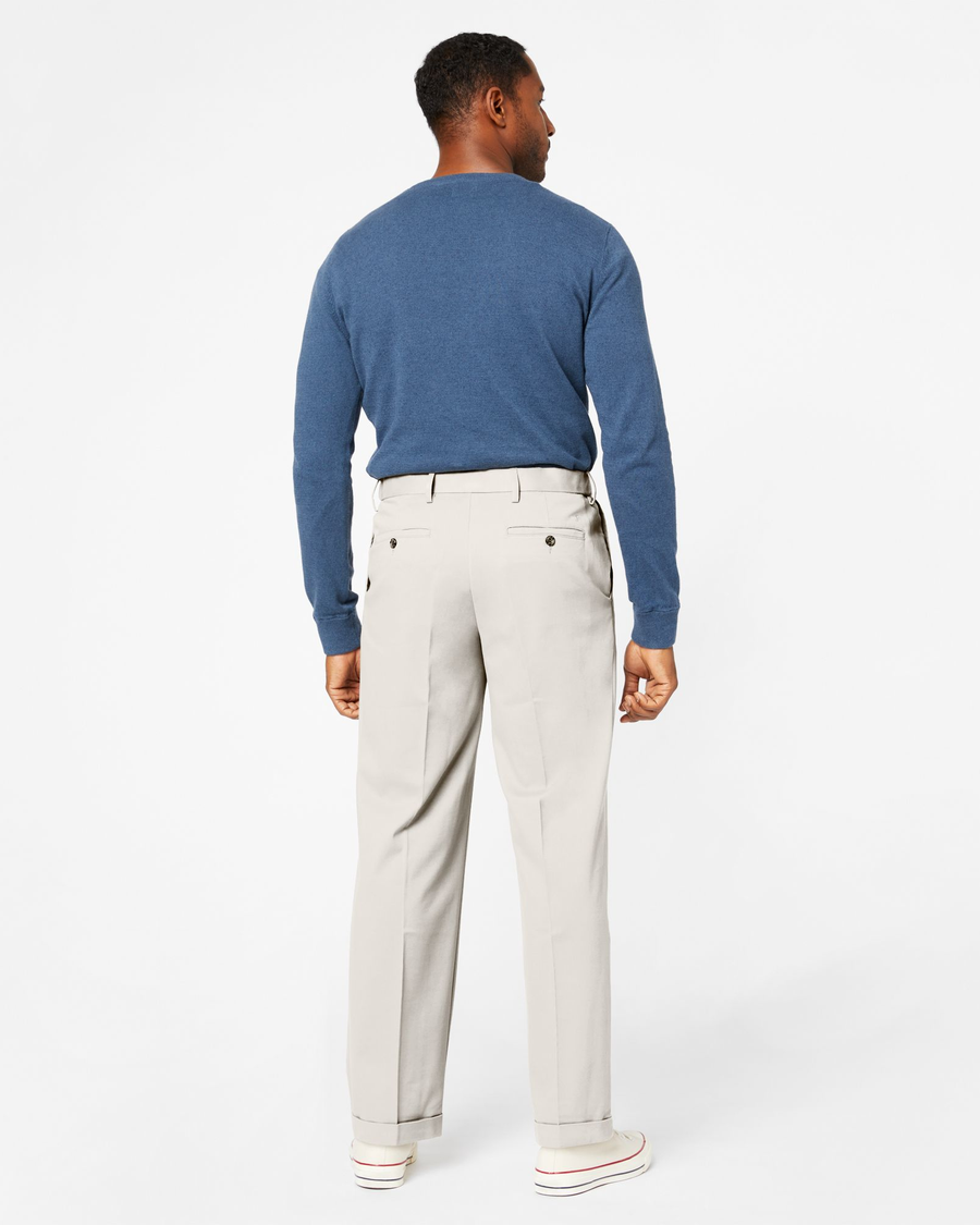 Back view of model wearing Porcelain Khaki Comfort Khakis, Pleated, Relaxed Fit.