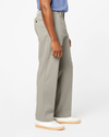 Side view of model wearing Porcelain Khaki Comfort Khakis, Relaxed Fit.