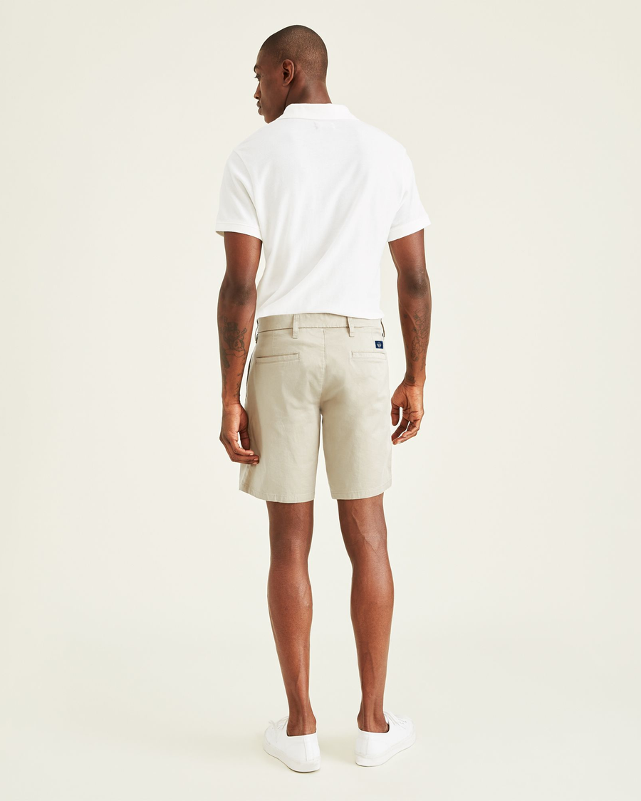 Back view of model wearing Porcelain Khaki Ultimate 9.5" Shorts, Straight Fit.
