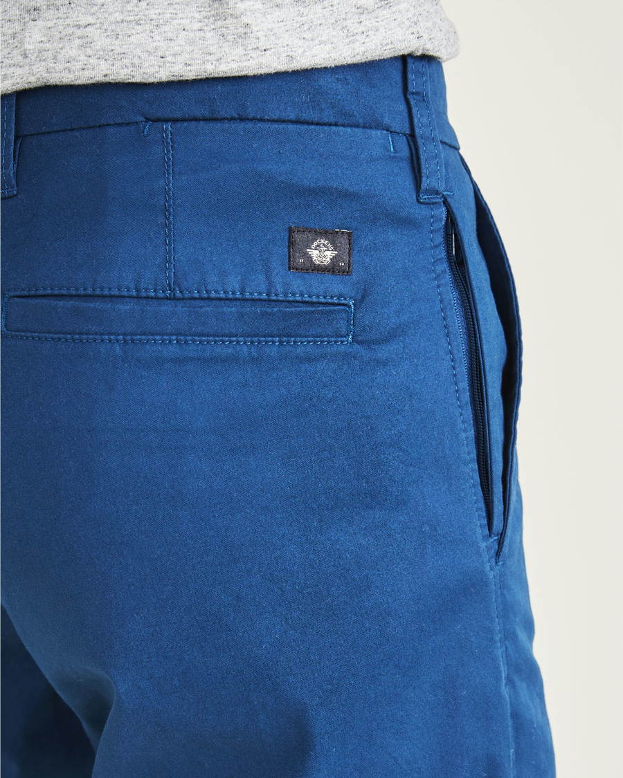 View of model wearing Poseidon Blue Ultimate 9.5" Shorts.