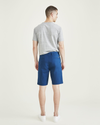 Back view of model wearing Poseidon Blue Ultimate 9.5" Shorts.